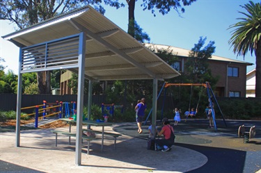 Undercover picnic tables protect families while eating