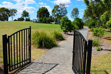 A paved pathway takes you from one end of the park to the other