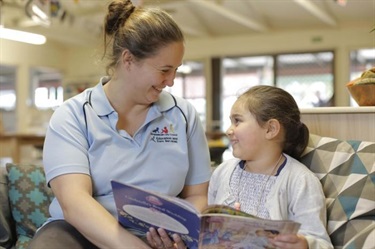 Educator reading session with child