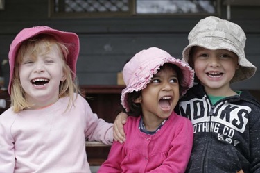 Three happy smiling children