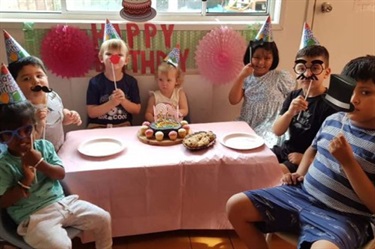 Children celebrating a birthday party