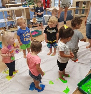 Children doing foot paint