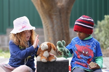 Children with toy animals