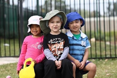 Three children outdoors