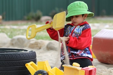 Boy in green hat