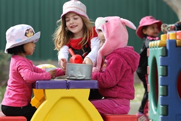 Children at purple table