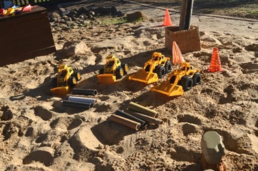 Trucks set up in the sandpit