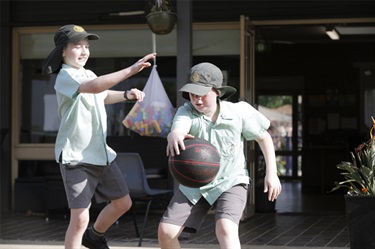 Kids playing Basketball