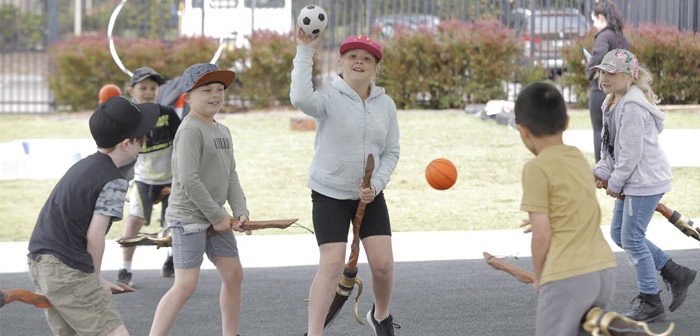 Children playing Quidditch