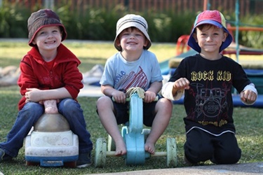 Boys on trikes