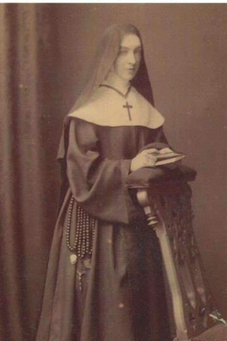 Sepia portrait of a religious woman, Mother Placid