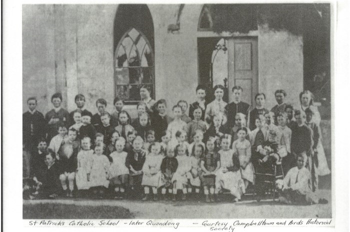 Black and white photo of school students in 1800s