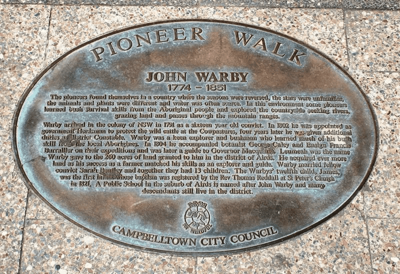 Plaque acknowledging John Warby Pioneer and telling his story 