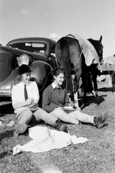 People relaxing after a fox hunt