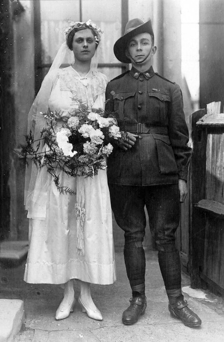 A wedding portrait of a soldier and his bride