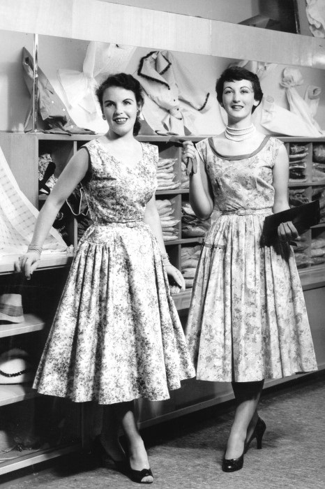 two young ladies in 1950s style dresses