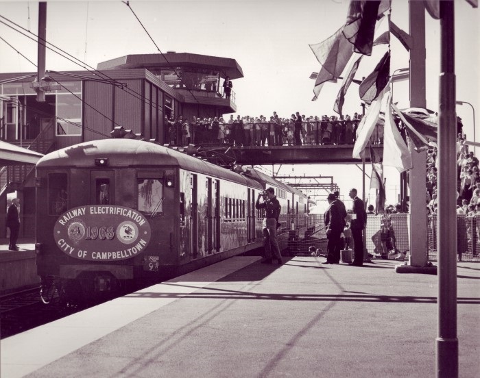 The first electric train pulling into Campbelltown Station