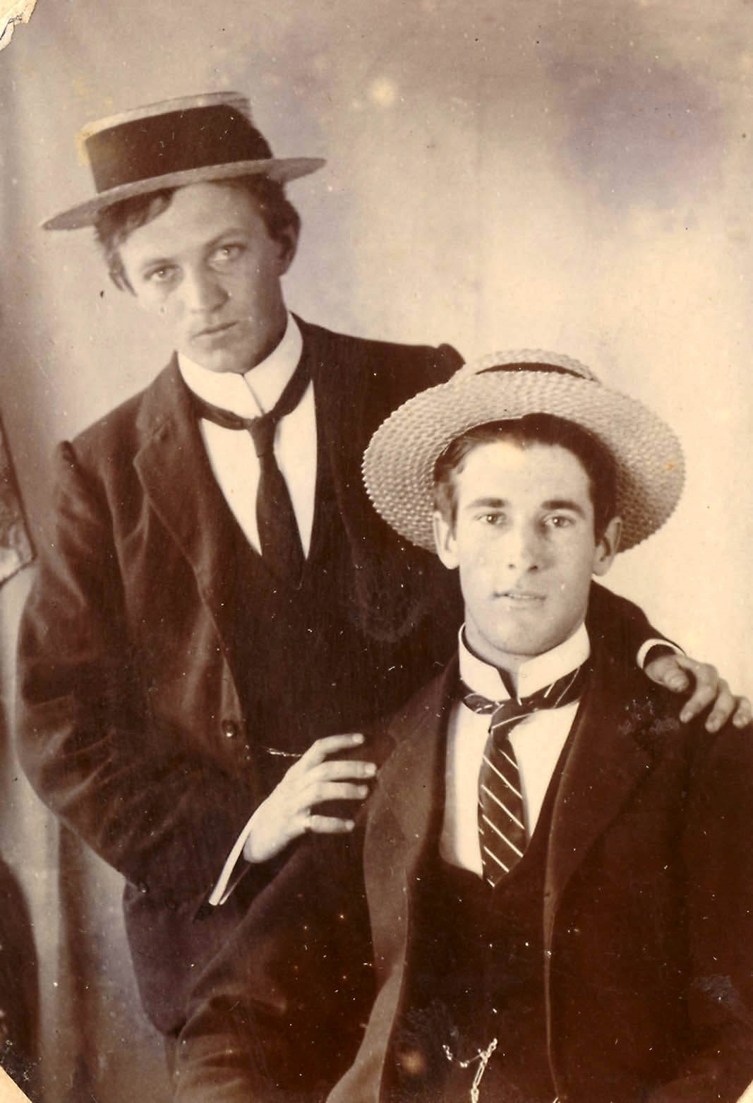 Two very dapper looking gentleman in suits