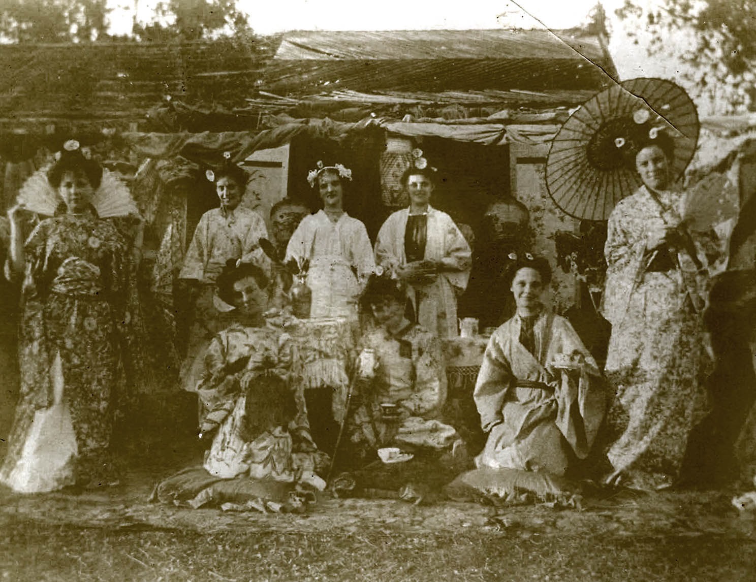 Old photograph of people dressed in Japanese attire