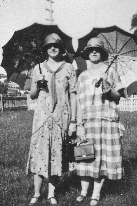 Two young ladies wearing the latest 1920s fashion