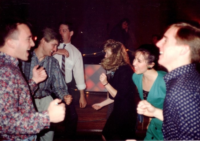 Locals dancing in a hall