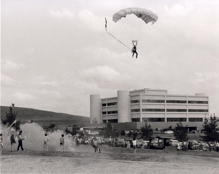 A parachute landing with the Campbelltown Hospital in the background 