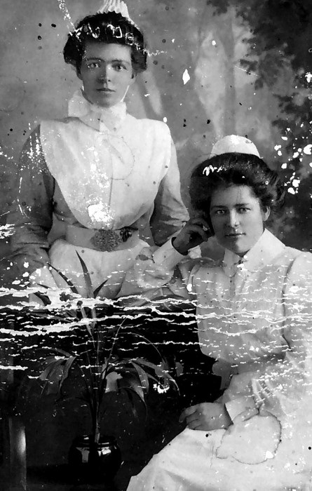 A portrait of two young Nurses in their uniform 