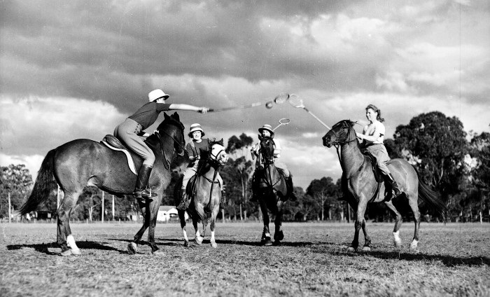 A polocrosse game in action