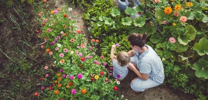 Mum with a kid in the garden