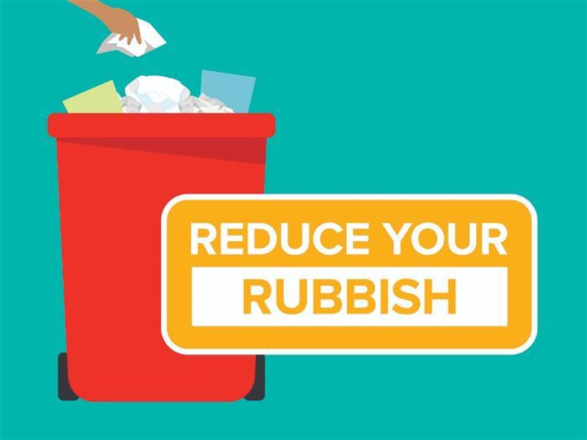 Image of a red bin full of rubbish and a hand dropping more rubbish into the bin with a slogan saying Reduce Your Rubbish