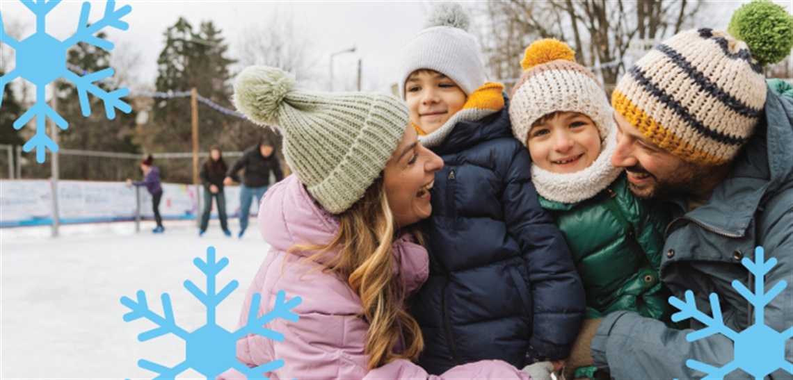 Family on ice skating rink