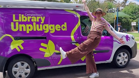 Library Unplugged Van and Woman