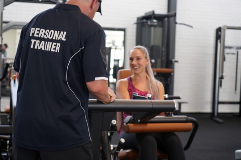 Personal trainer with client